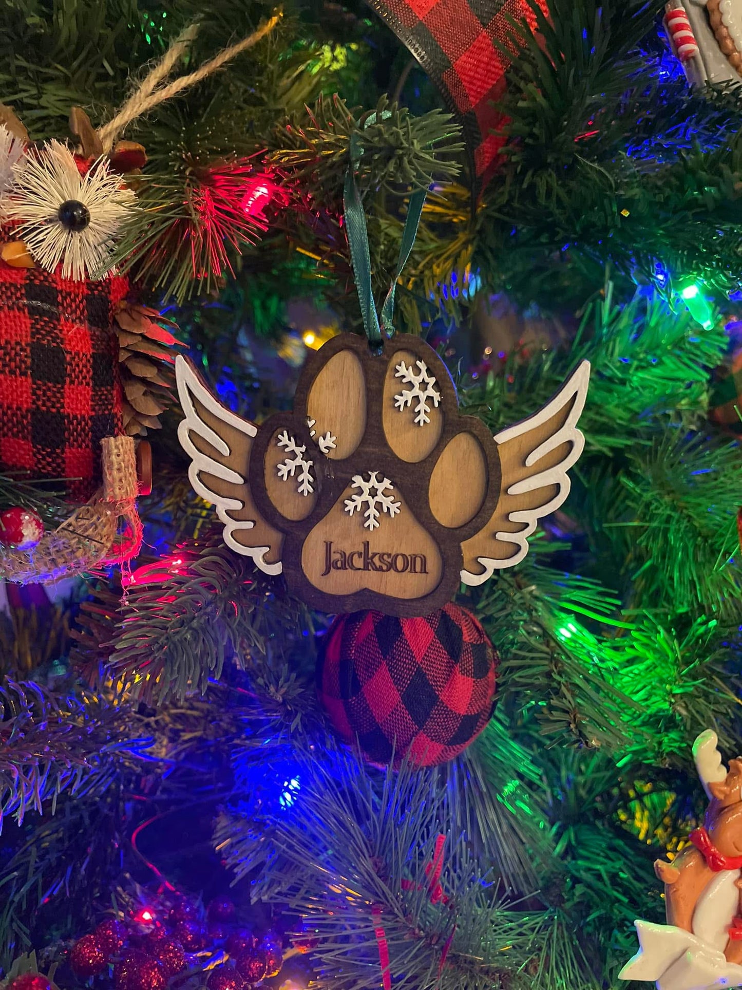 Dog paw print ornament with wings